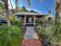Beautiful cottage with a lovely front porch.