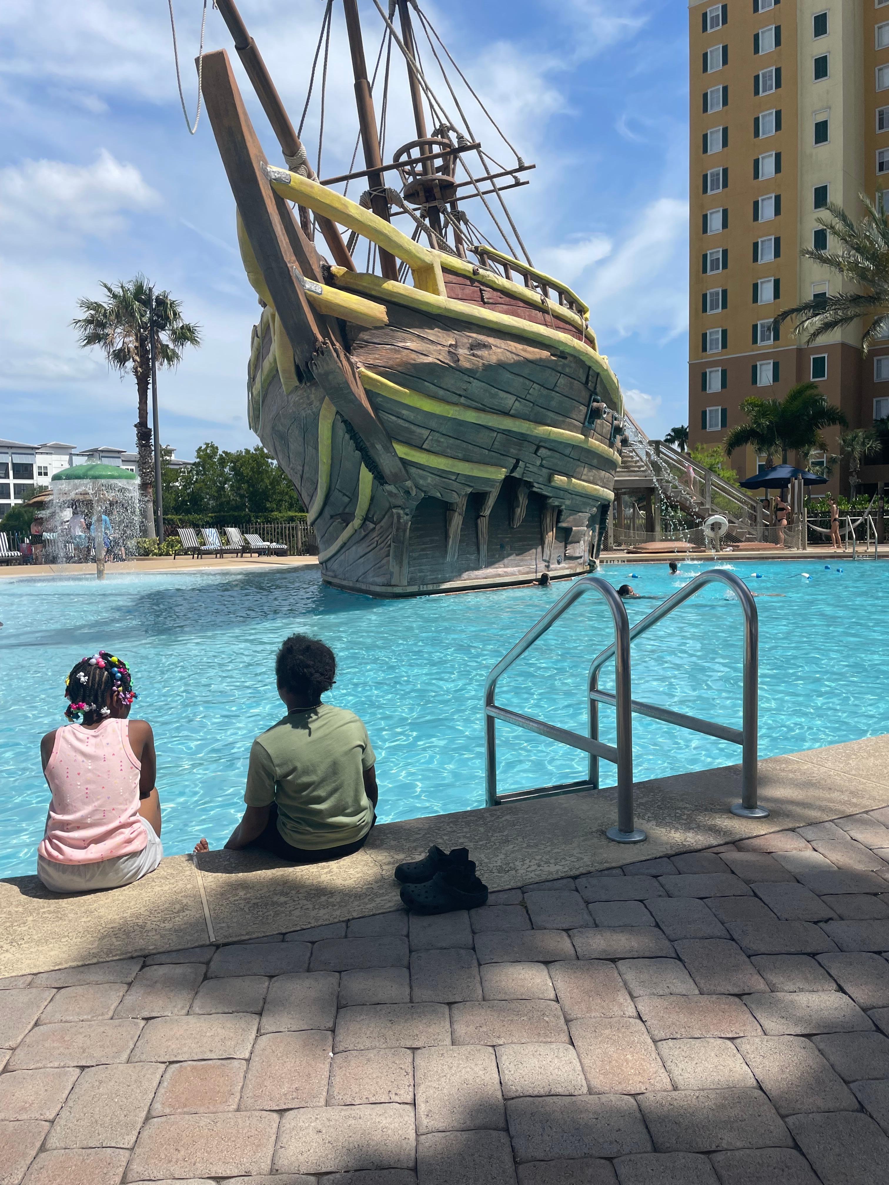 My two oldest anticipating the slide..they got to get on the nxt day..we were still in clothes
