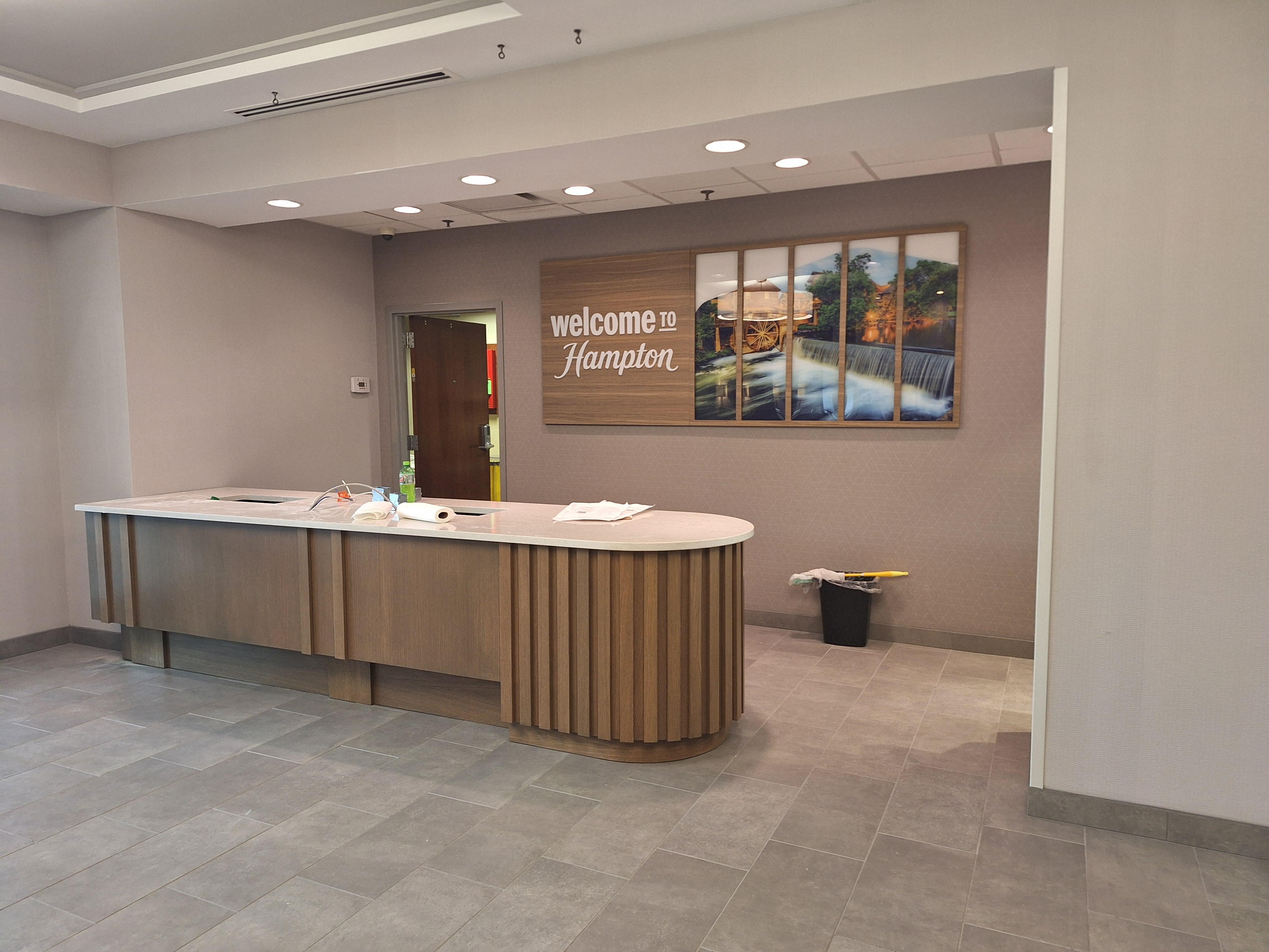 Front desk being put in.
