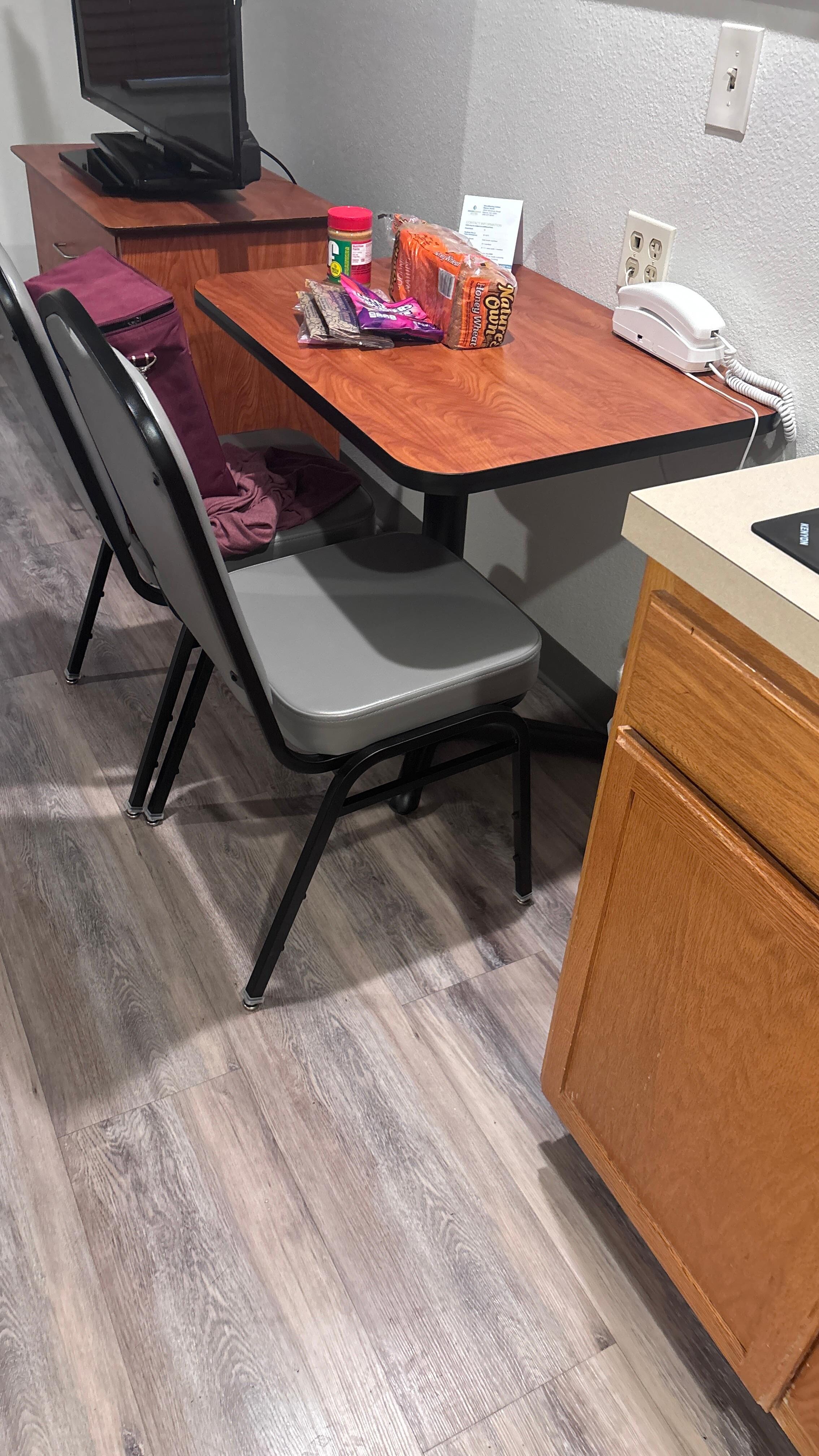 The extra chair in the room.