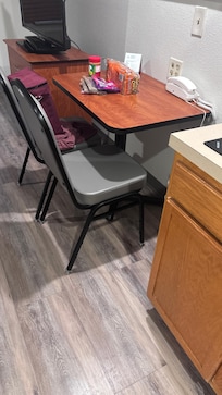 The extra chair in the room.
