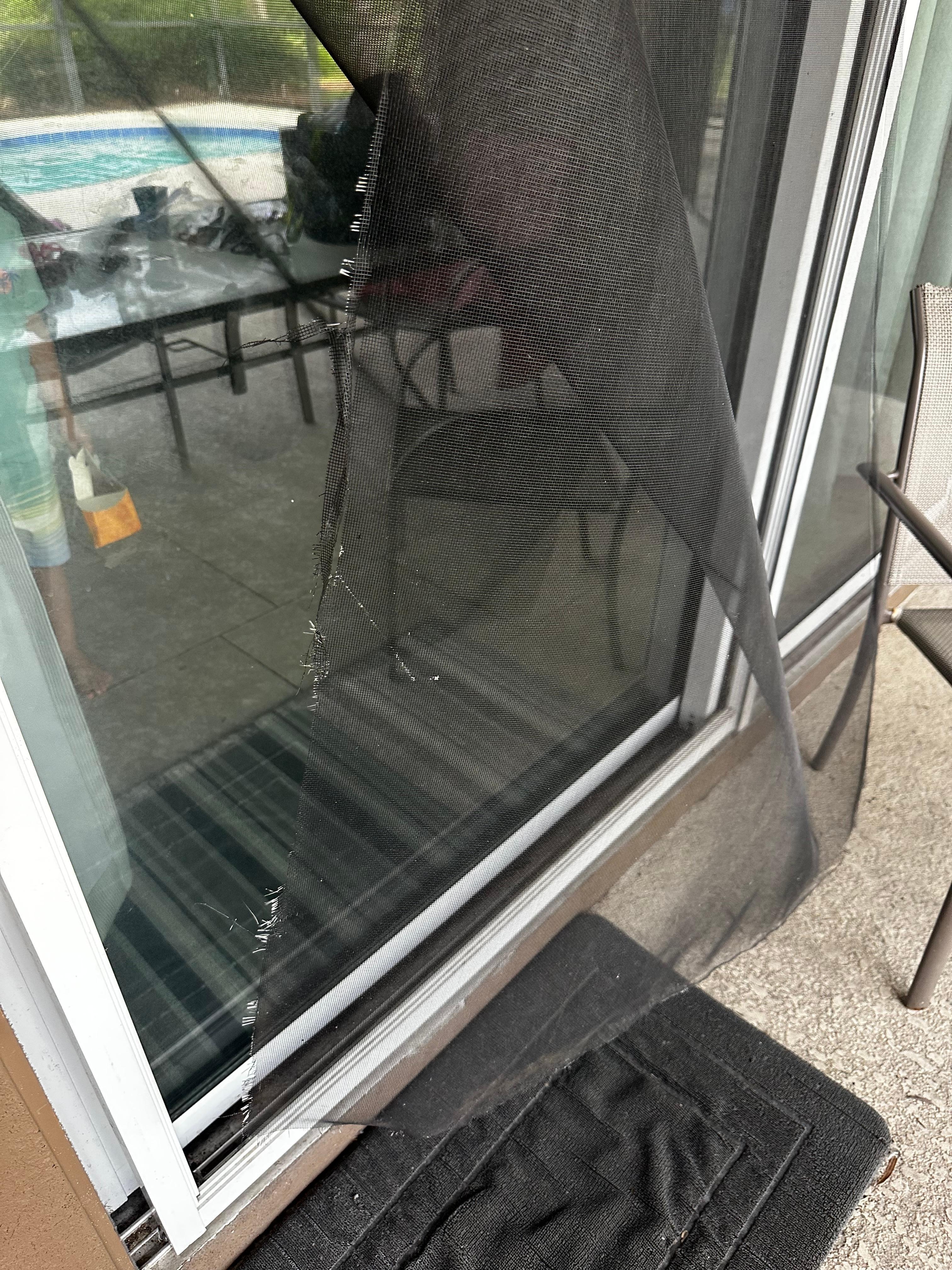 Sliding screen door unusable.  Screens around pool were also pushed out 
