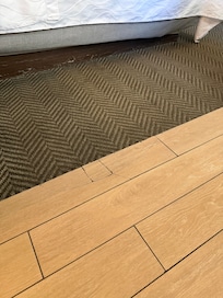 Floors were chipped and cracked so you had to have shoes on all the time. The carpet was so gross it was worn to the wood and full of stains