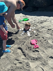 The kids had lots of fun digging holes in the sand and getting “buried”!