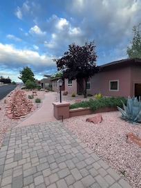 Outside the front of the house, driveway view