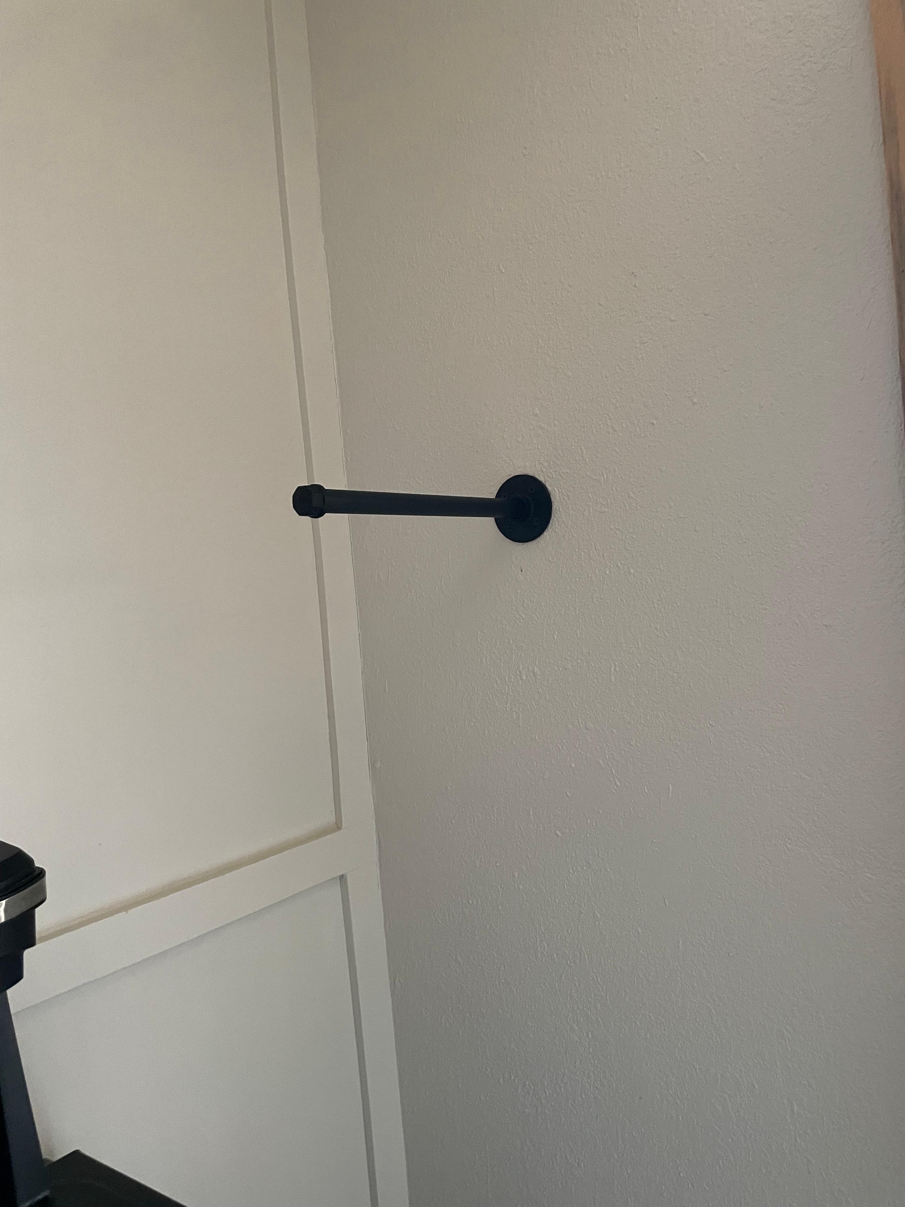 Would be nice to have a couple of hangers to hang coats on this post