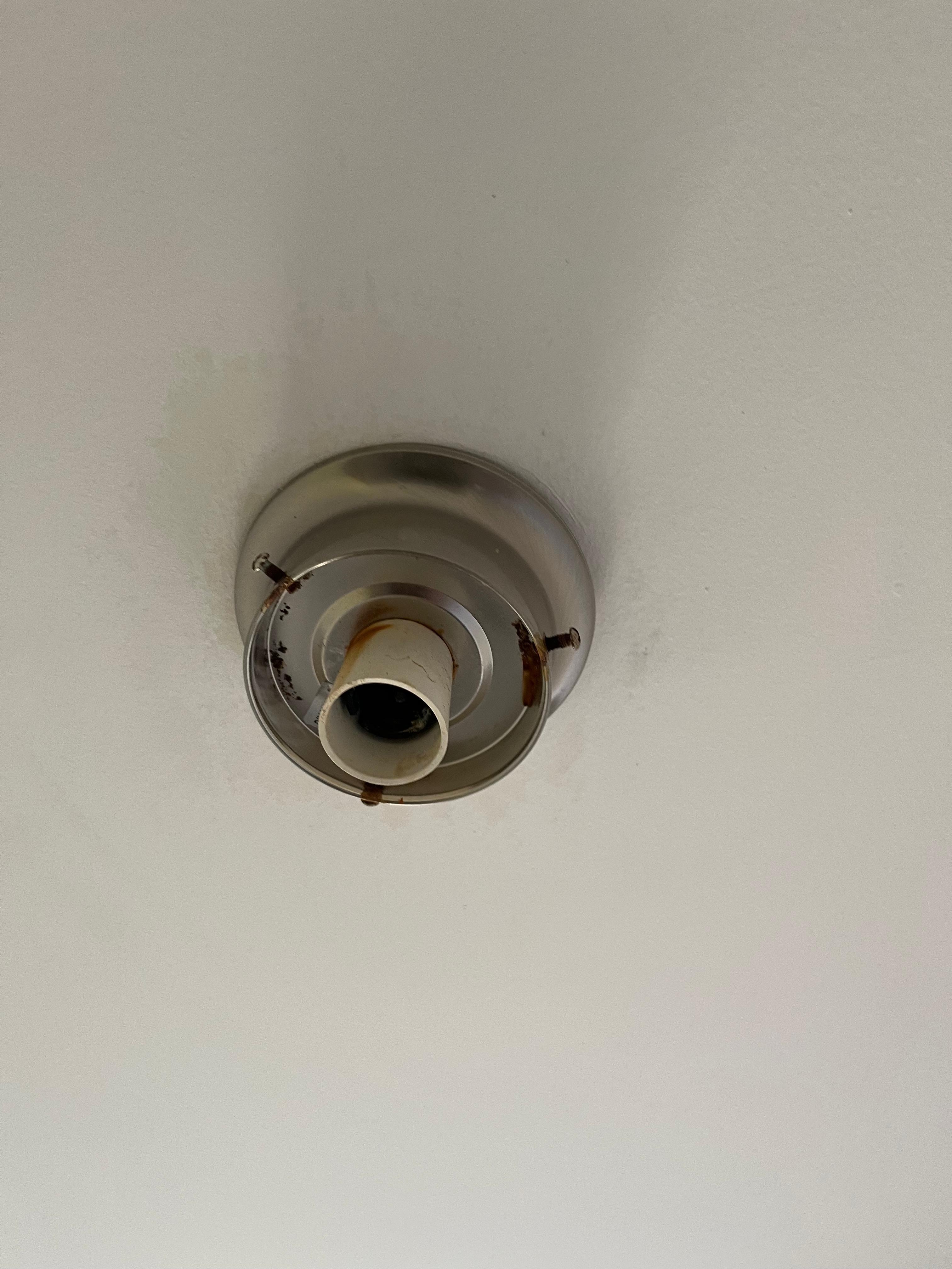 Toilet light that was full off water and incorrectly wired never got fixed
