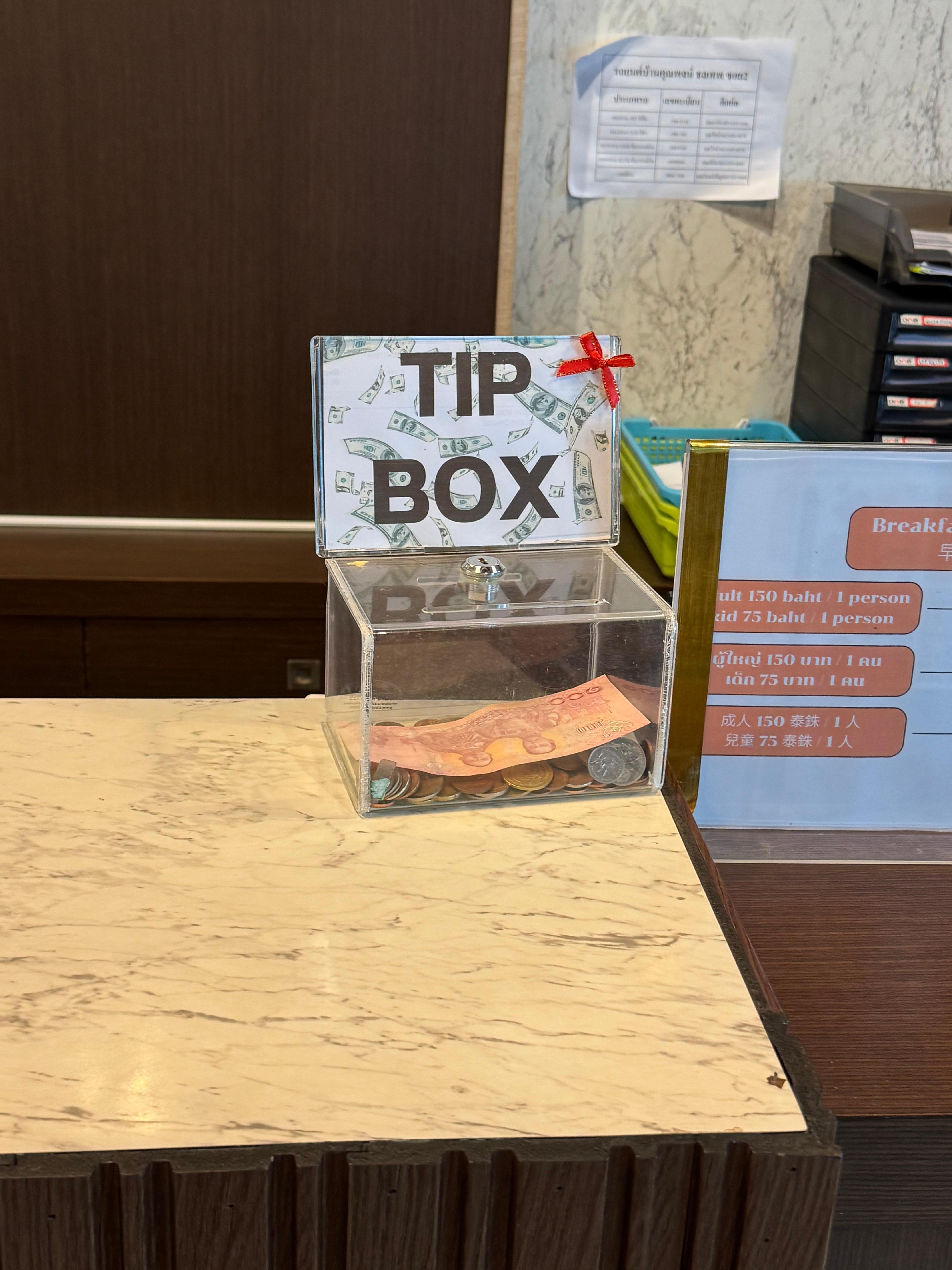 Tip box at the hotel reception 