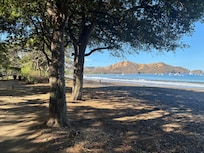 The beach is a 3 minute walk on level ground