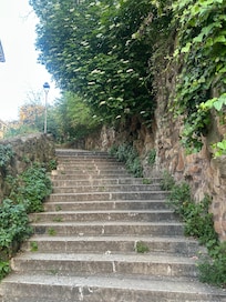 View of stairs next to building that will lead you to a beautiful view!