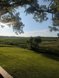Looking Off back master bedroom deck shows behind house.