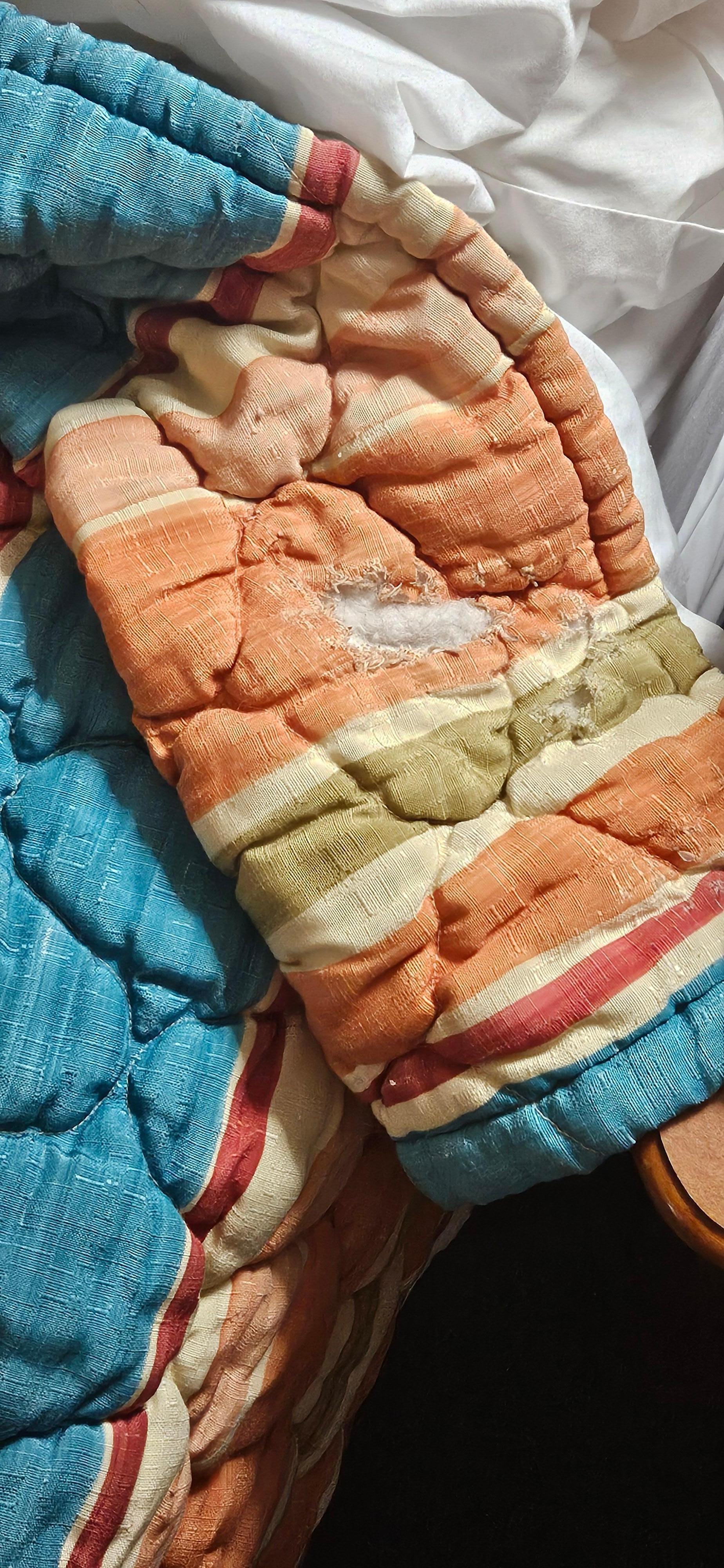 Ripped and unclean bedding