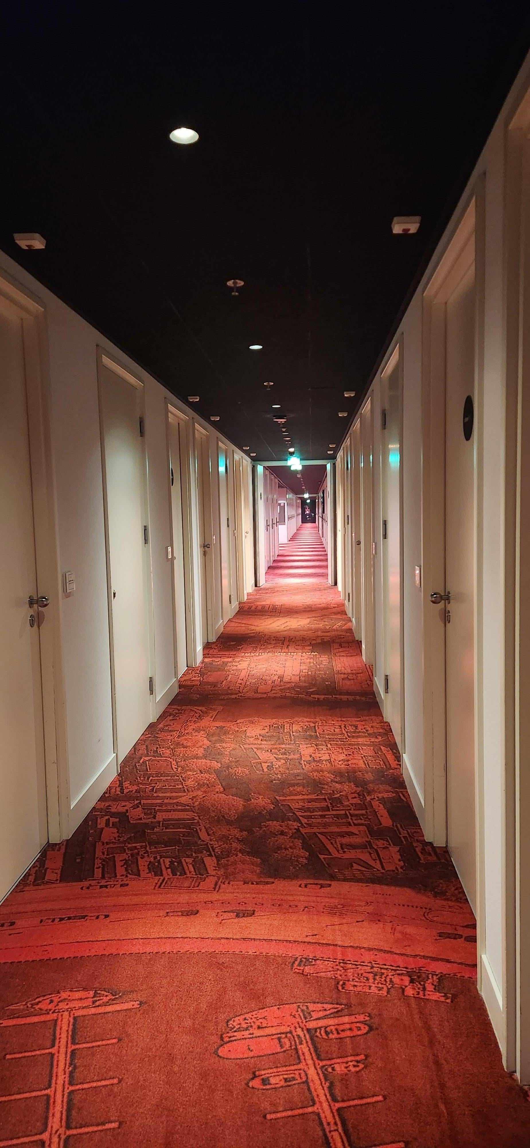A long hallway with tiny rooms, surprisingly quiet