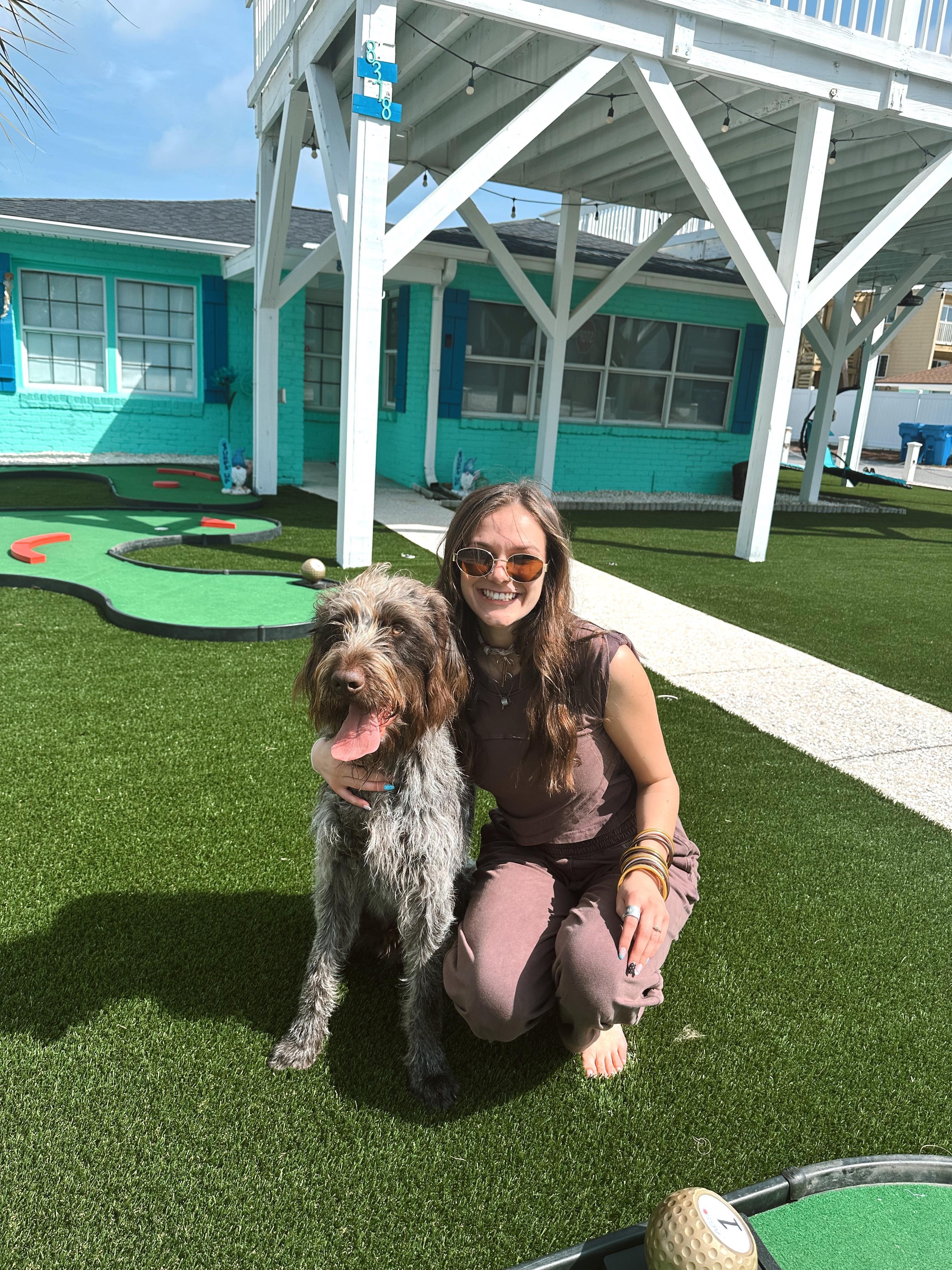 Jolie and Otis enjoying some afternoon putt putt
