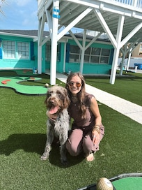 Jolie and Otis enjoying some afternoon putt putt