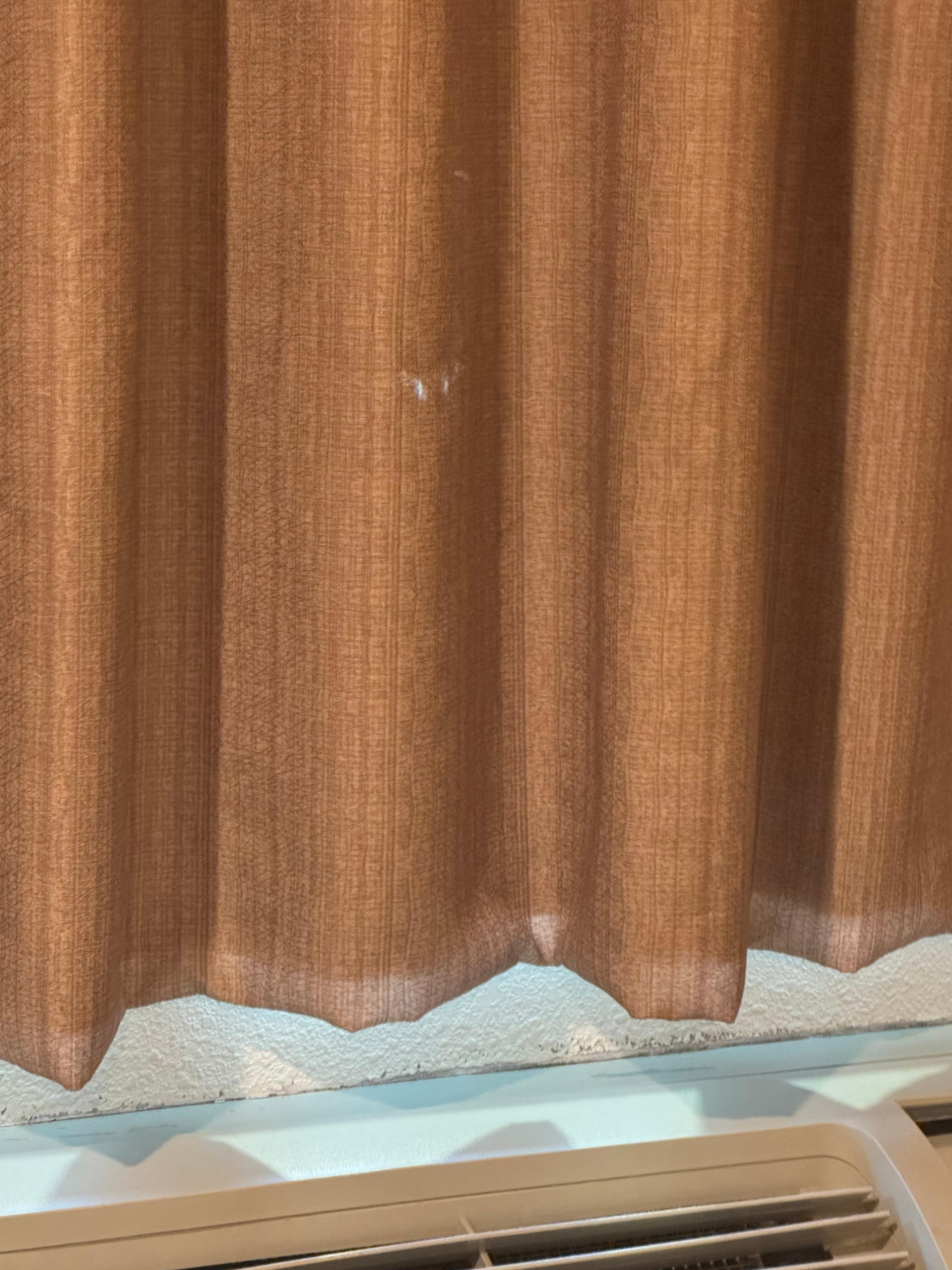 There were holes in the curtains.