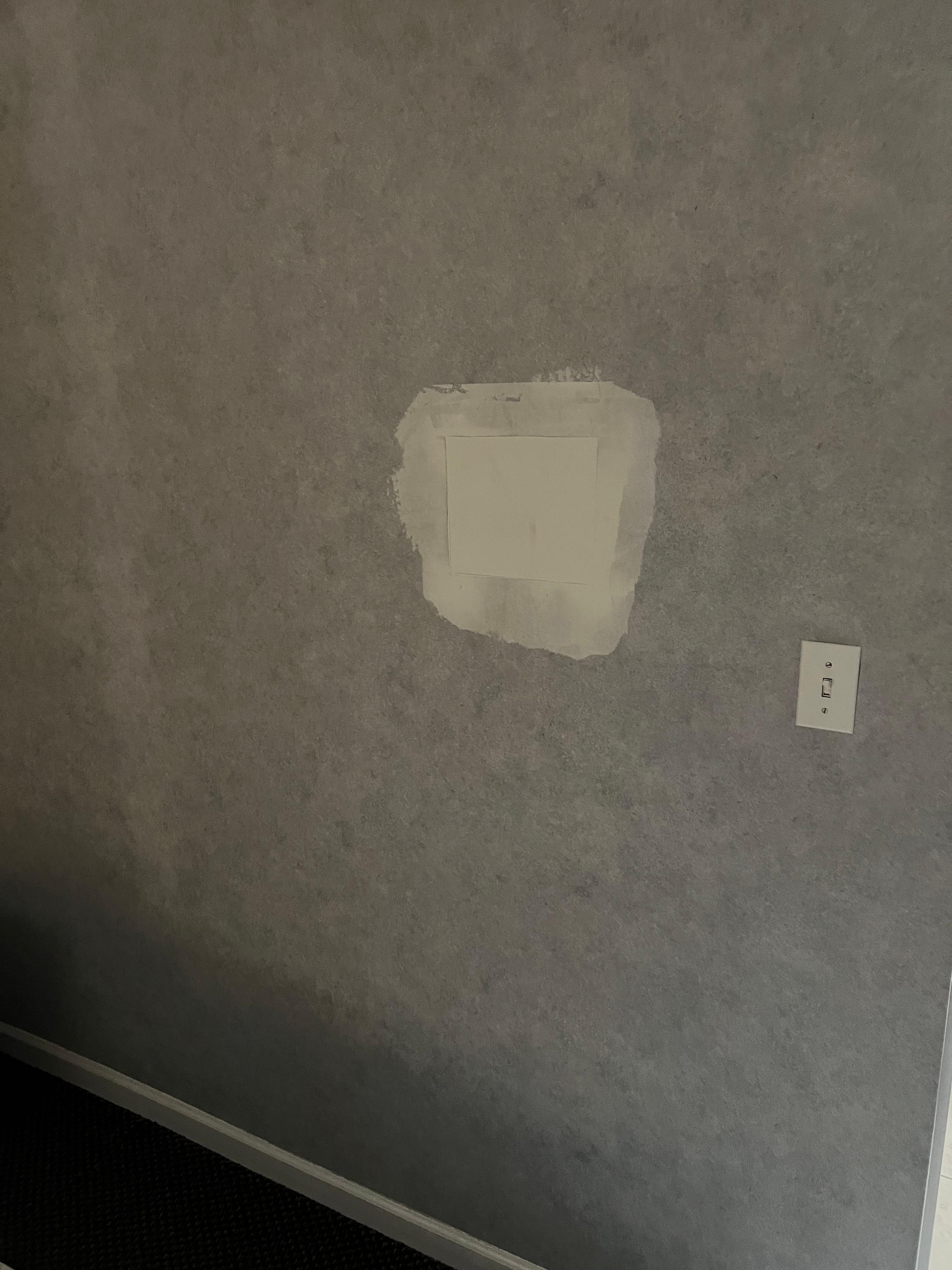 Spackle over wallpaper 