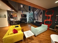 Cool, modern, comfy, fun common area! Love the Christmas trees!