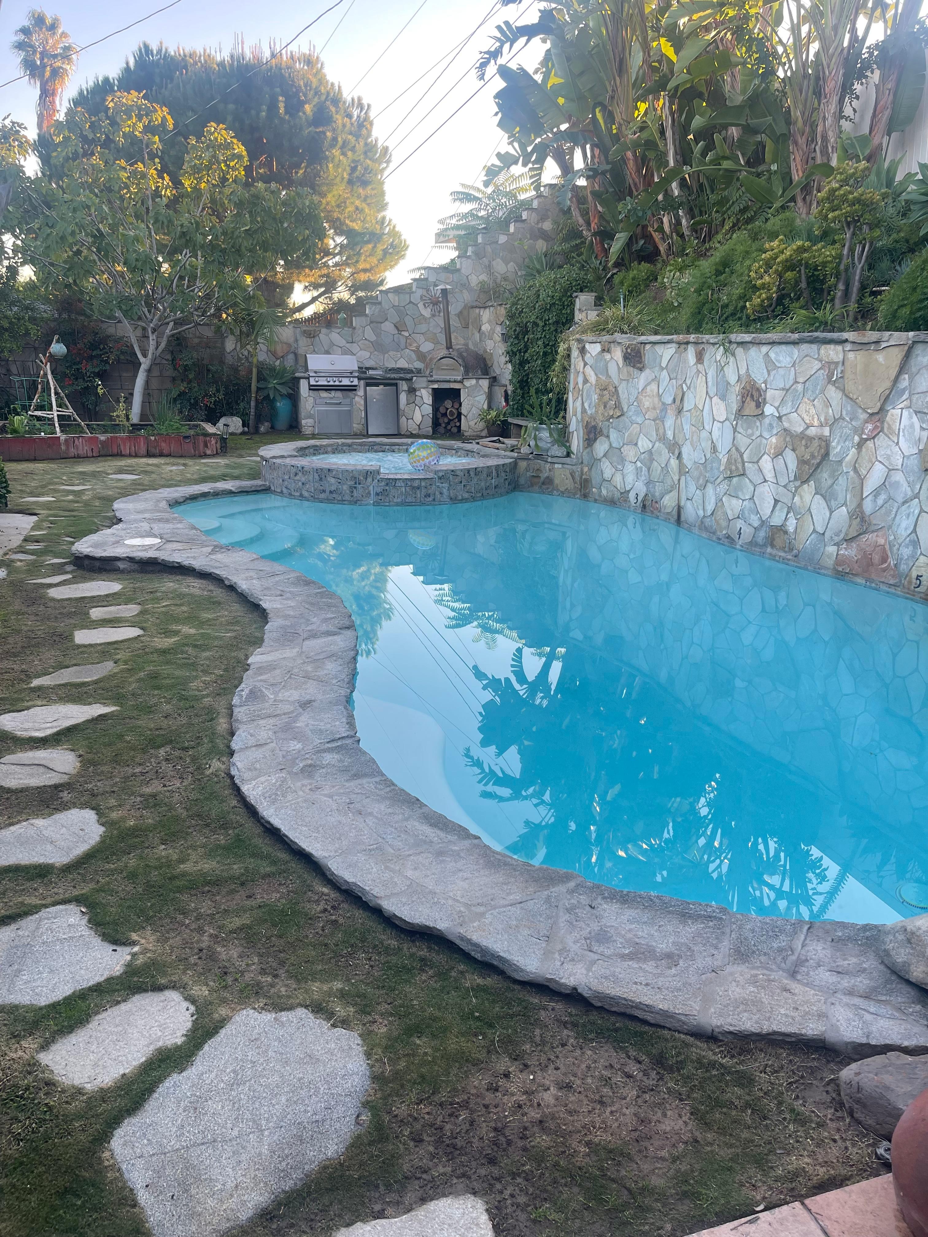Pool, hot tub, and bbq grill