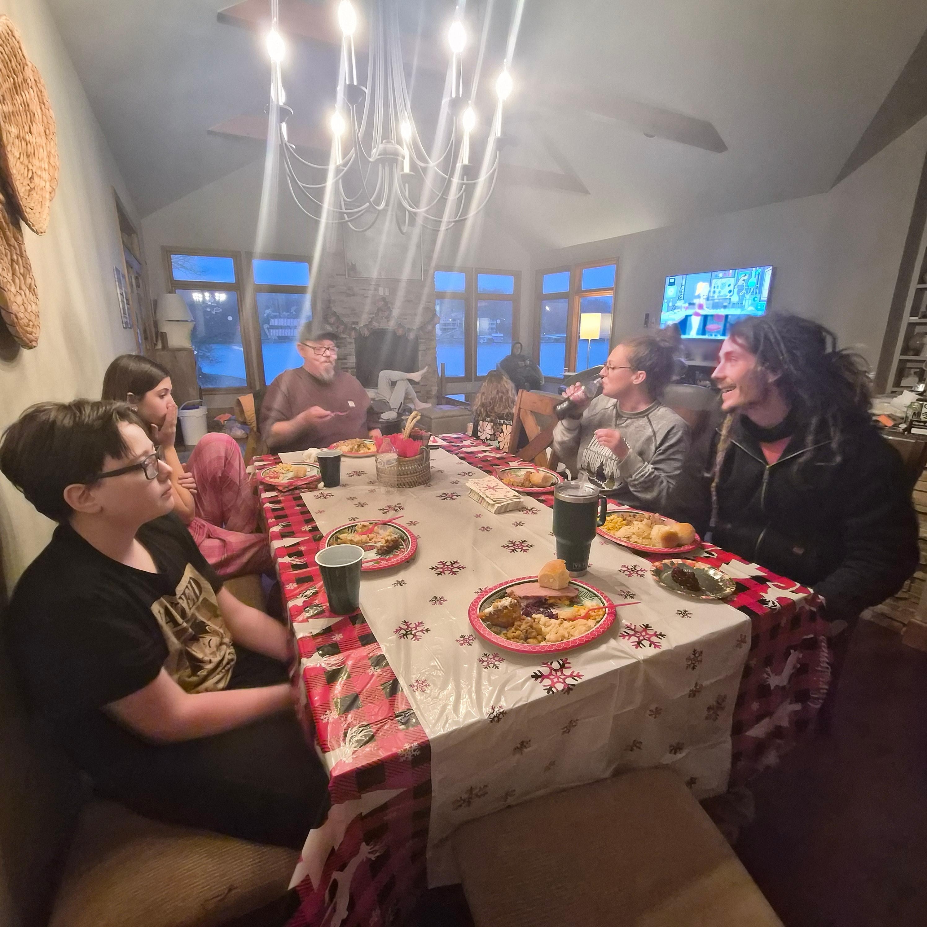 Sitting down for the Family Christmas Dinner, plenty of room for our crew.