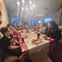 Sitting down for the Family Christmas Dinner, plenty of room for our crew.