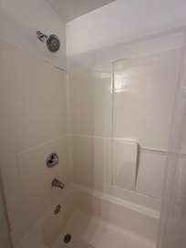 plastic shower insert with peeling paint