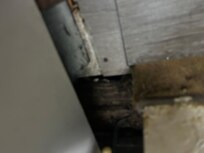 Hole in the floor of our room under the air conditioning unit