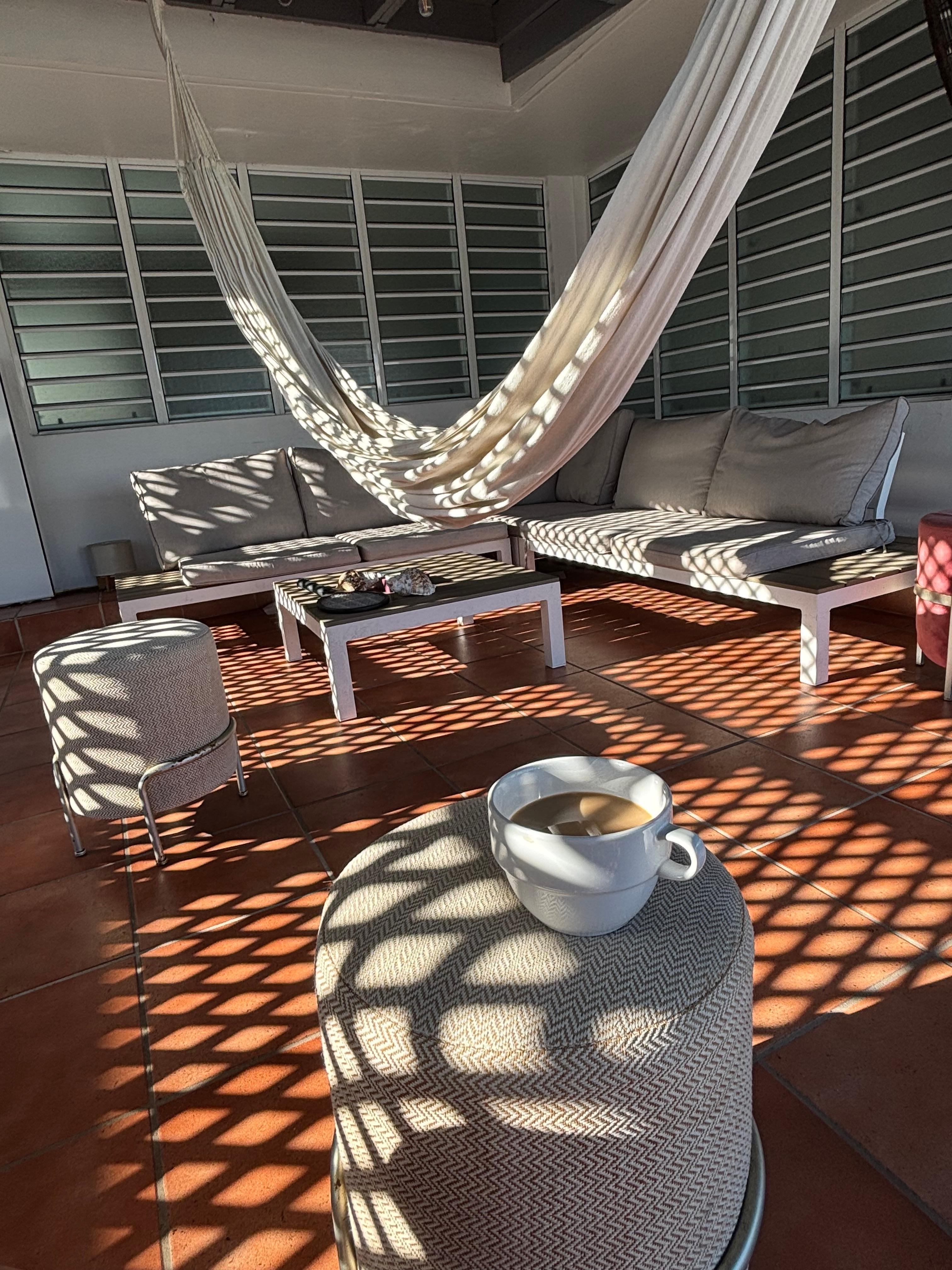 Private patio with laundry and a grill