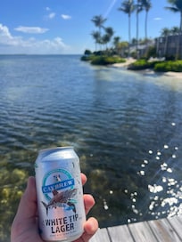 Enjoy a local cold beverage on the private dock, watching the fish swim by and the boaters going to/from Kaibo!