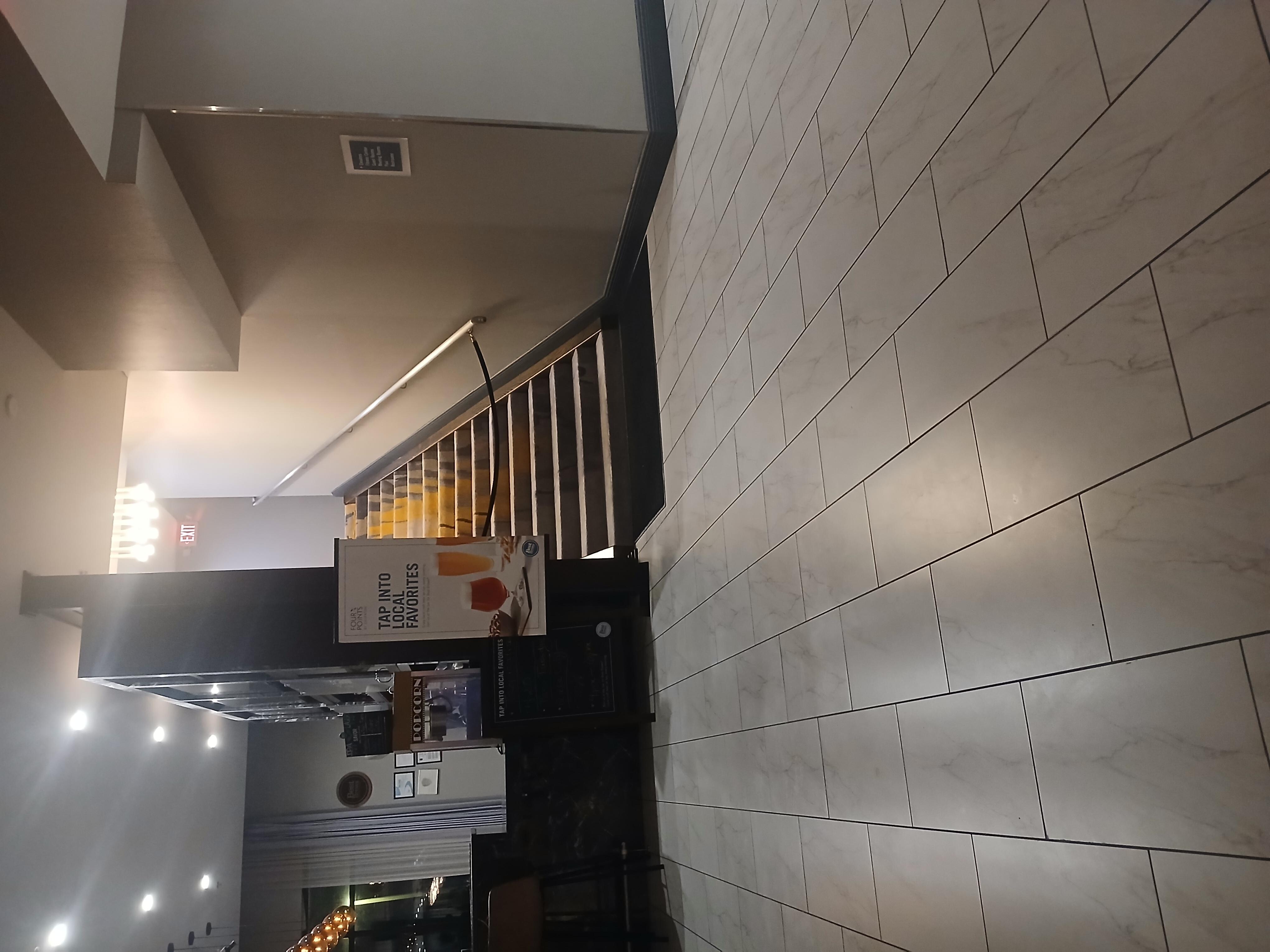 Stairs next to the bar