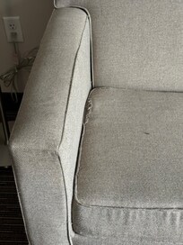 Worn couch cushion