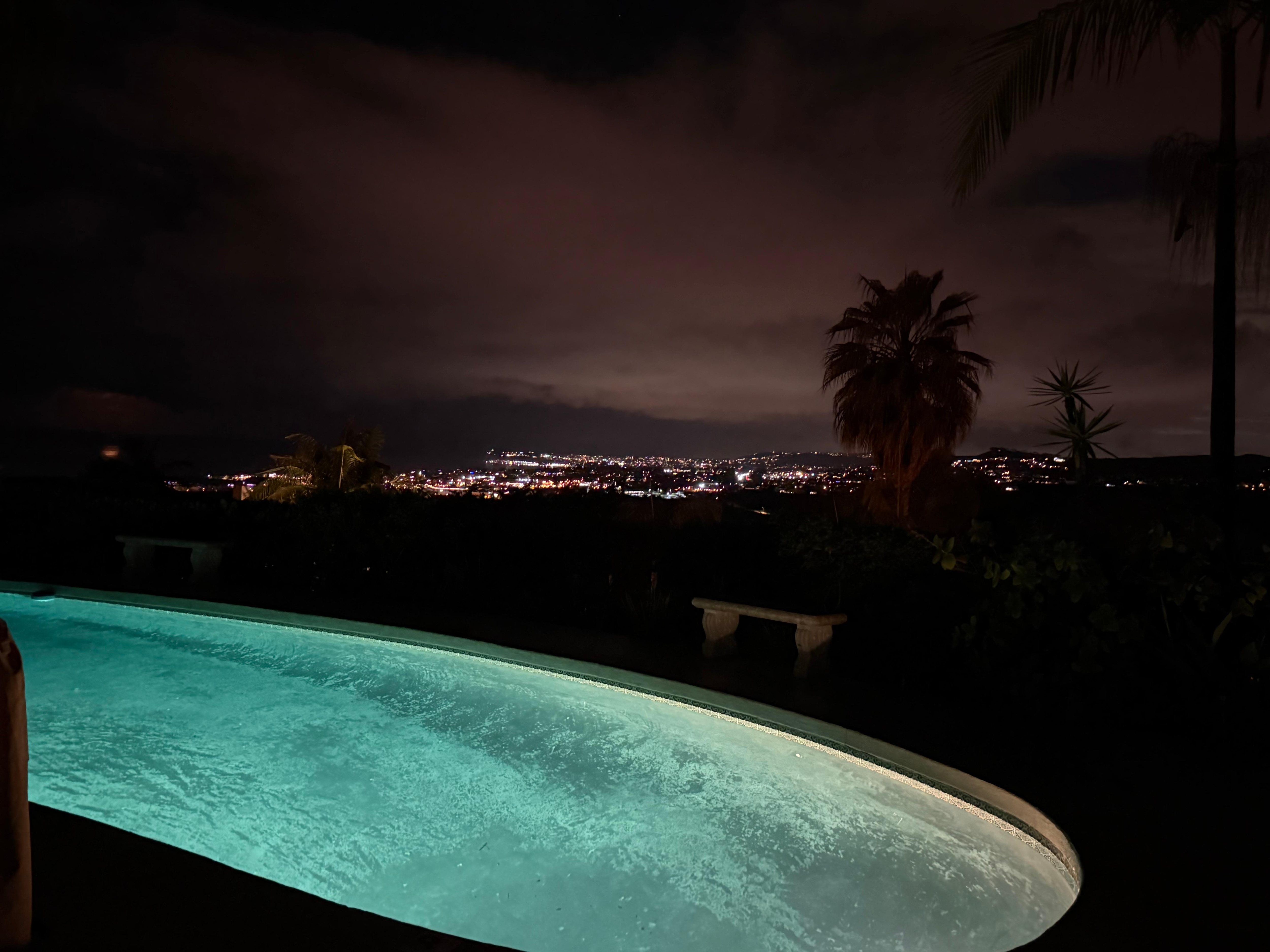 Pool deck at night. 