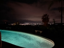 Pool deck at night.