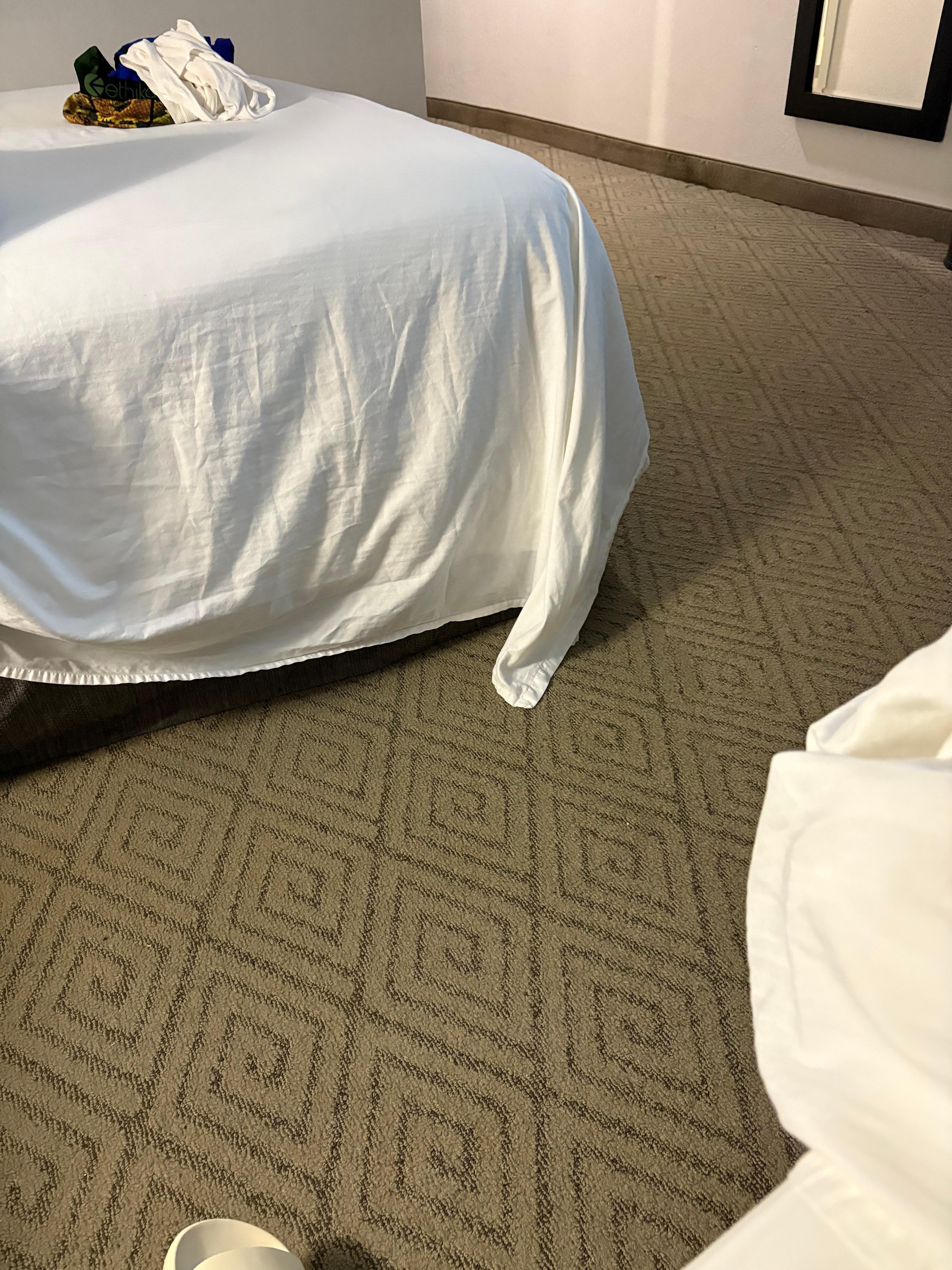 They don’t even make the beds correctly here! Sheets touching the floor! 