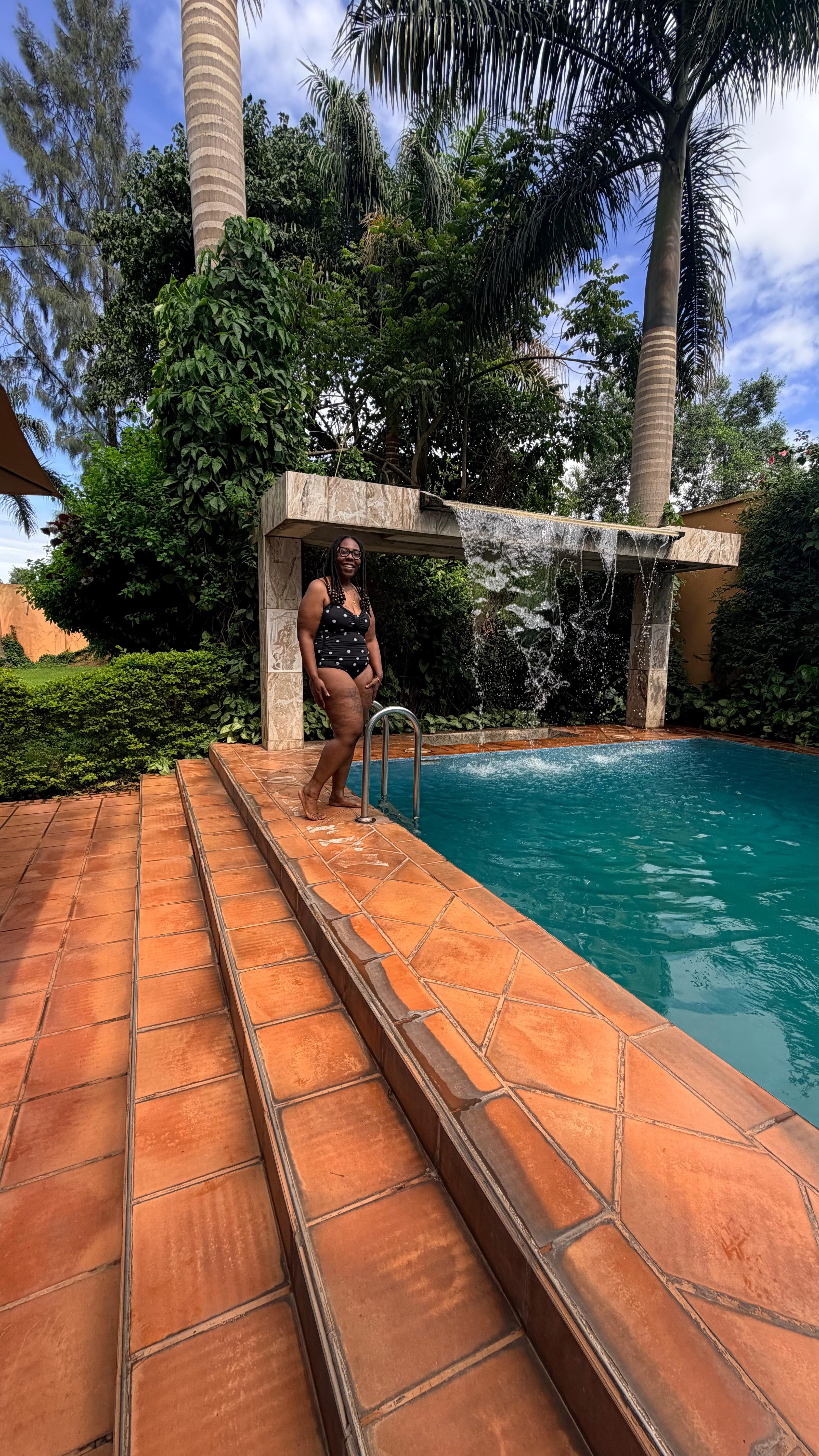 aesthetic pool with water fountain 