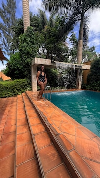 aesthetic pool with water fountain