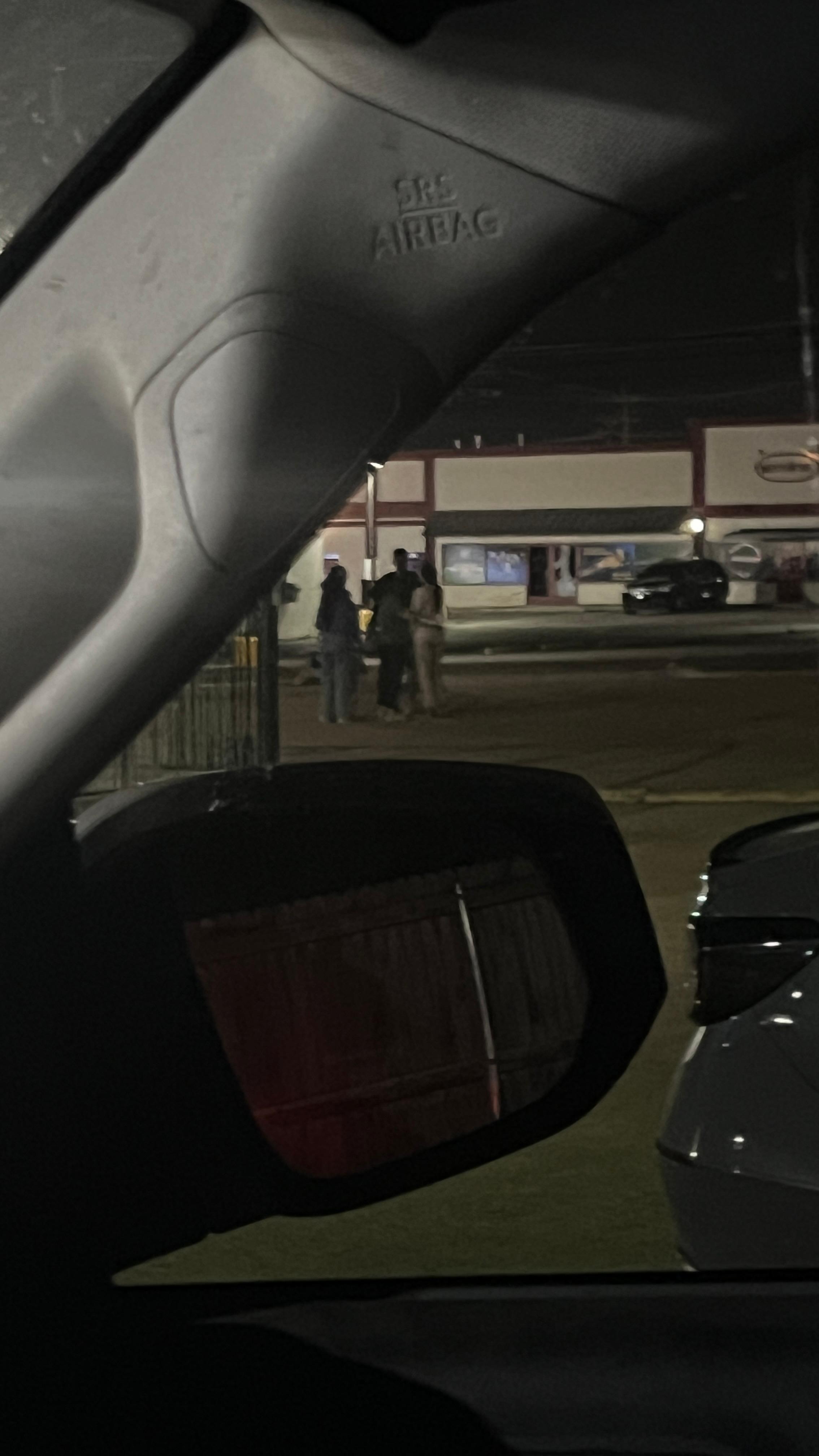 People were standing around outside 