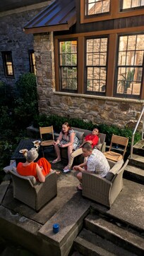 enjoying the patio at night while fireflies pass by.