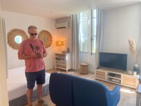 Sitting/bedroom/kitchen — looks onto pretty courtyard