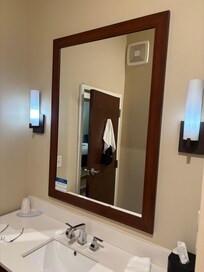 Dim lighting of bathroom mirror