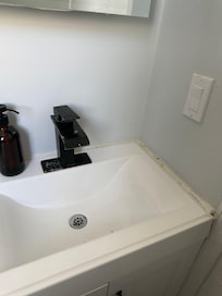 Outdated bathroom with rust everywhere