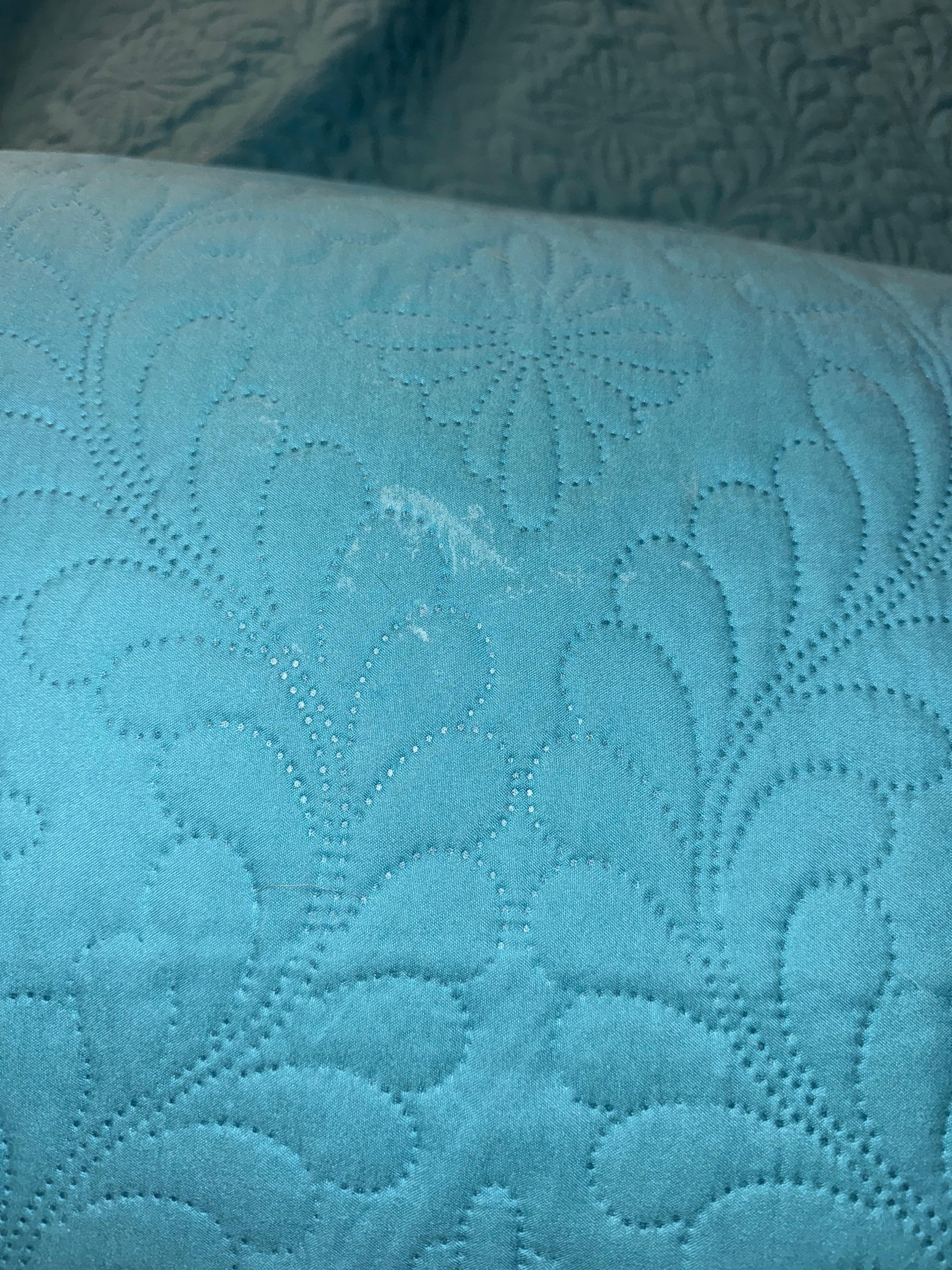 Stain on bed quilt 