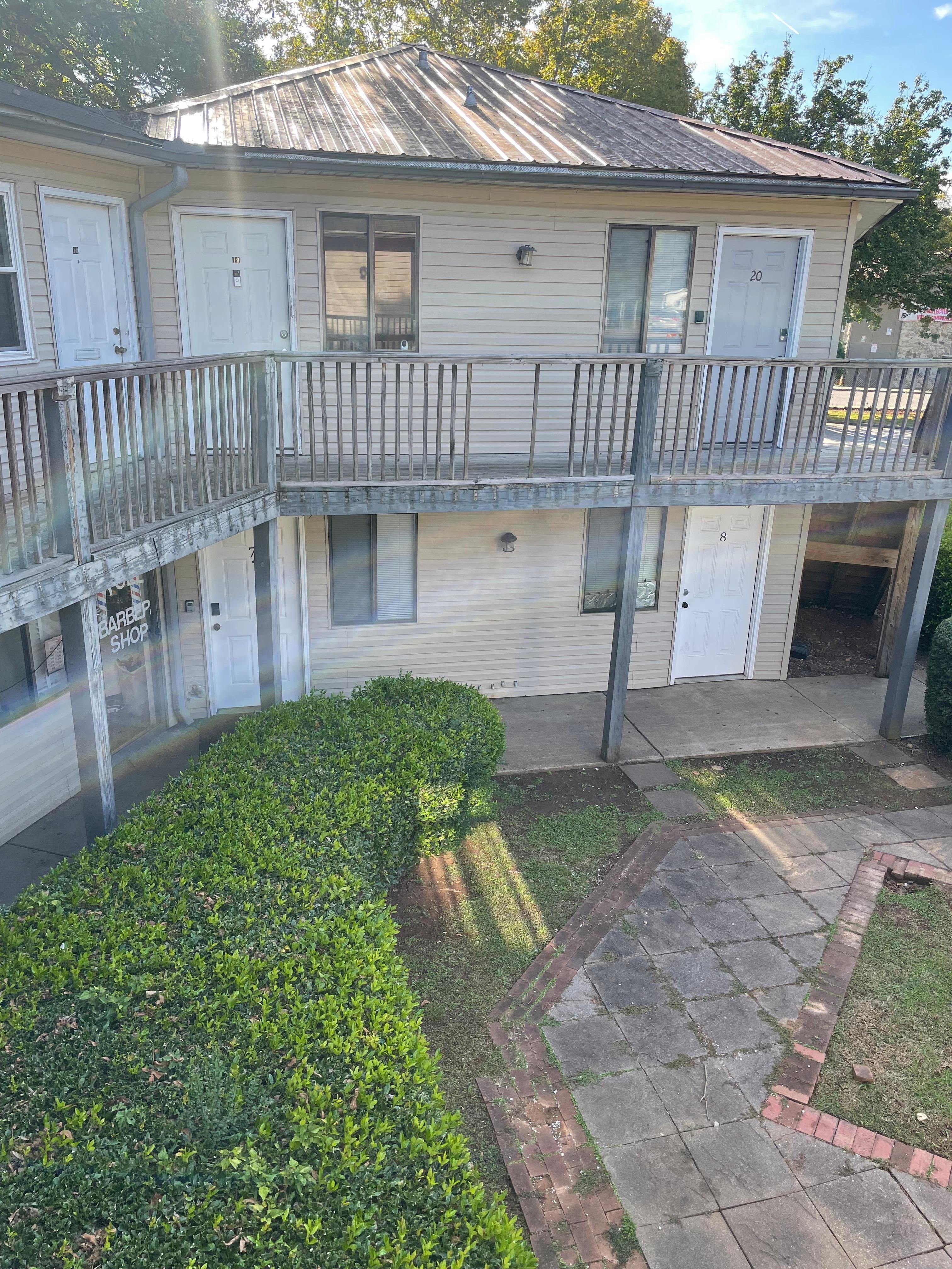 The railing was missing making it a safety hazard. A child could fall right through the opening.