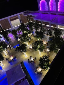 View of hotel courtyard from rooftop terrace