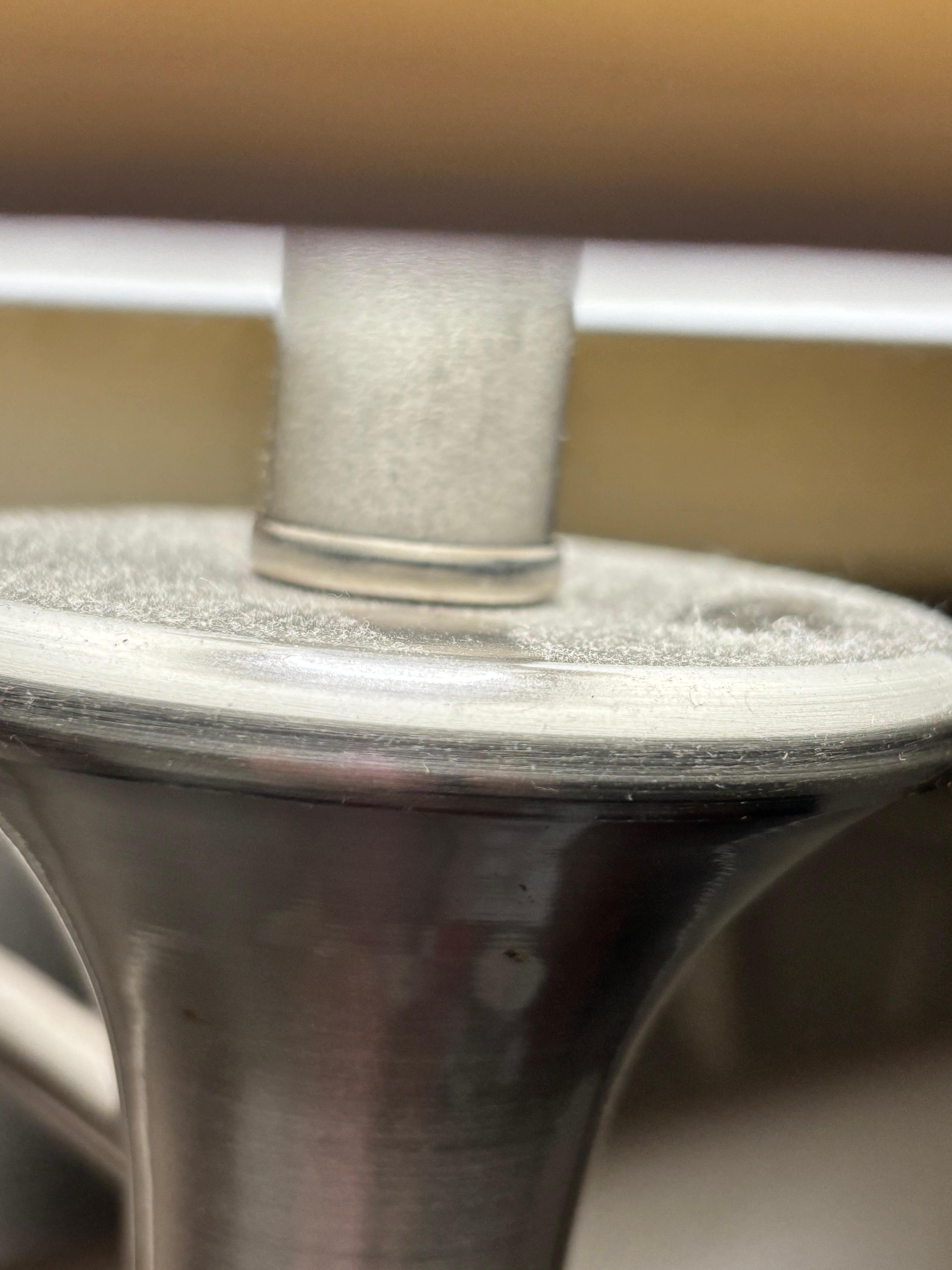 Dust on bedside lamp 