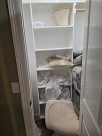 3rd bedroom closet, almost no room since it was stuffed with extra home decor and bedding.