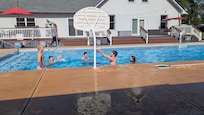 Kids hanging in the pool