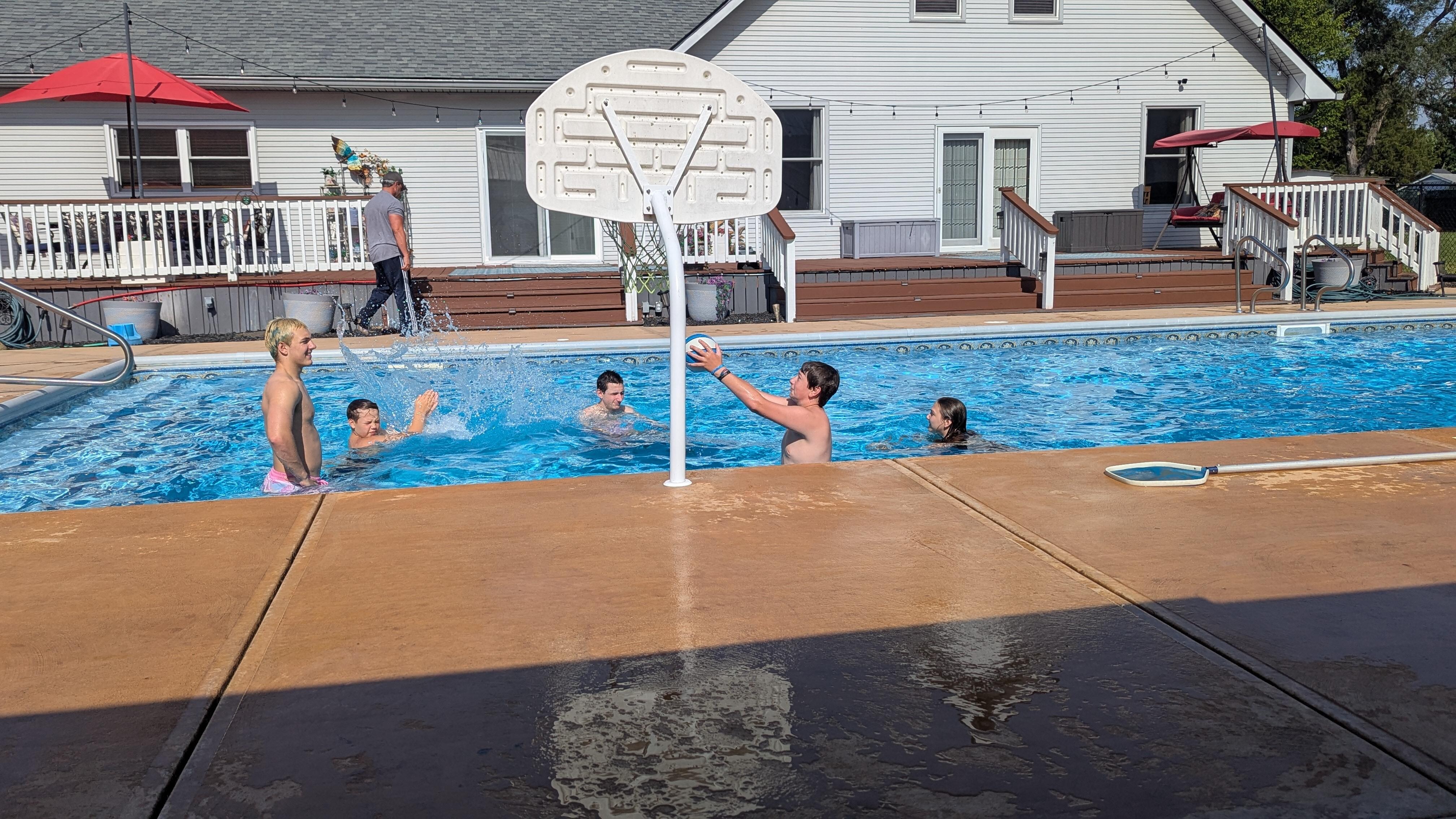 Kids hanging in the pool