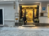 My friend Ginny at the hotel entrance.