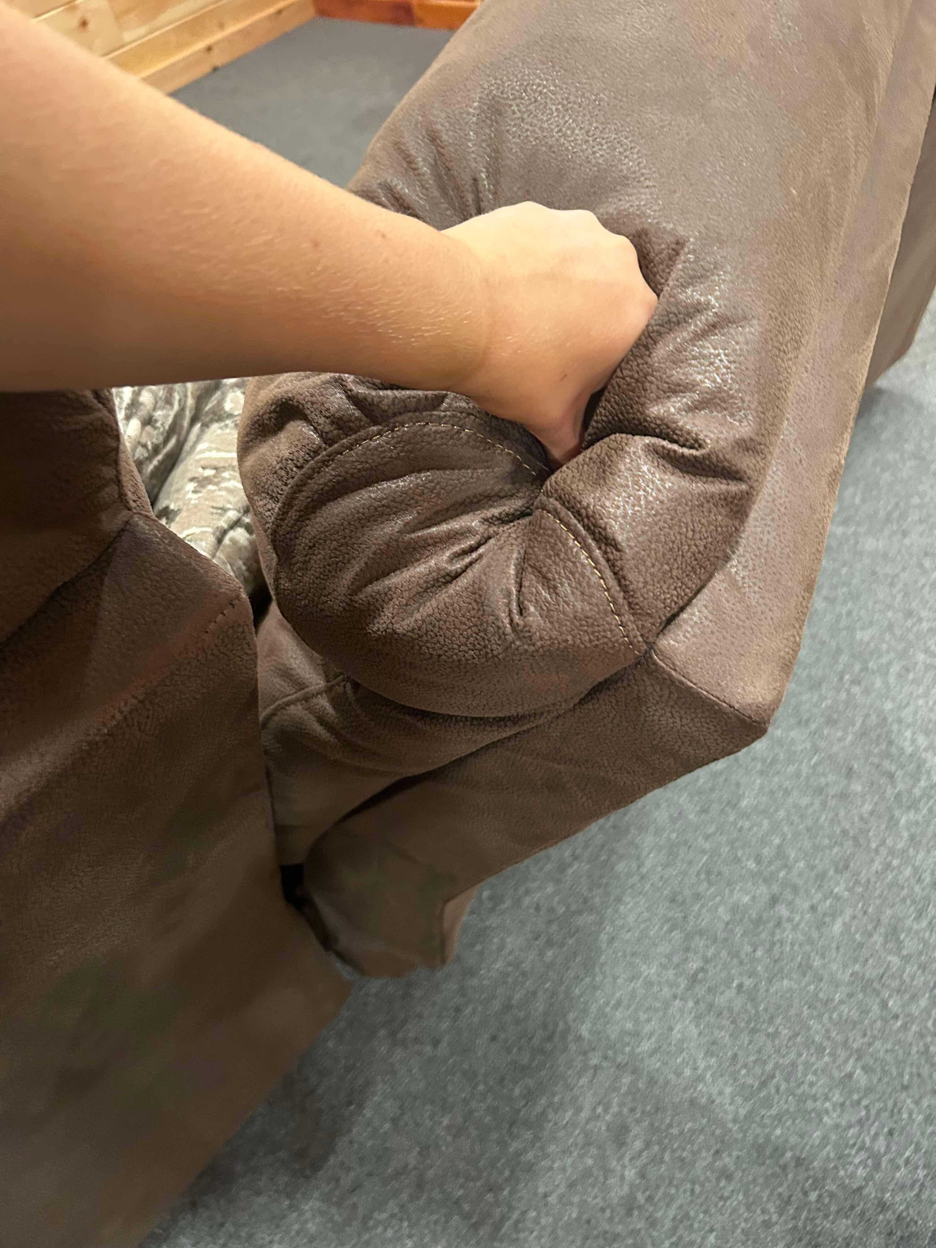 Broken couch- the only seating downstairs